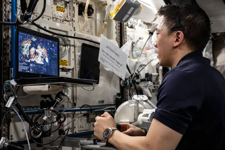 A robotic real-time strategy game in space