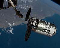 Soyuz rocket positioned at Baikonur for ISS crew launch as Cygnus XL temporarily removed