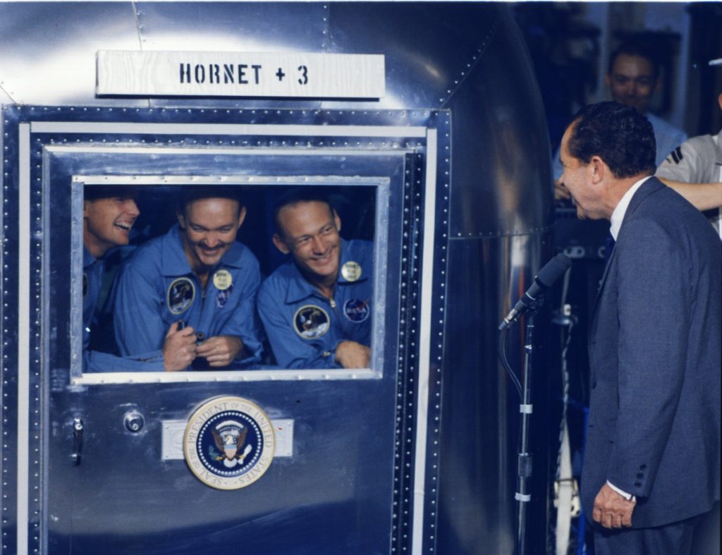 Armstrong, Aldrin, and Collins in solentary confinment with President Nixon