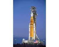 NASA rolls Moon rocket off launchpad for repairs