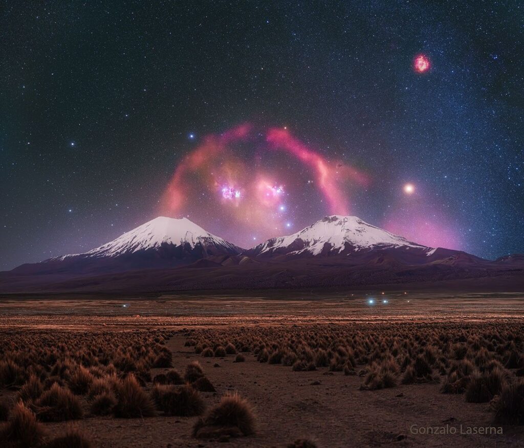 APOD: 2026 July 28 – Barnards Loop over Twin Volcanoes
