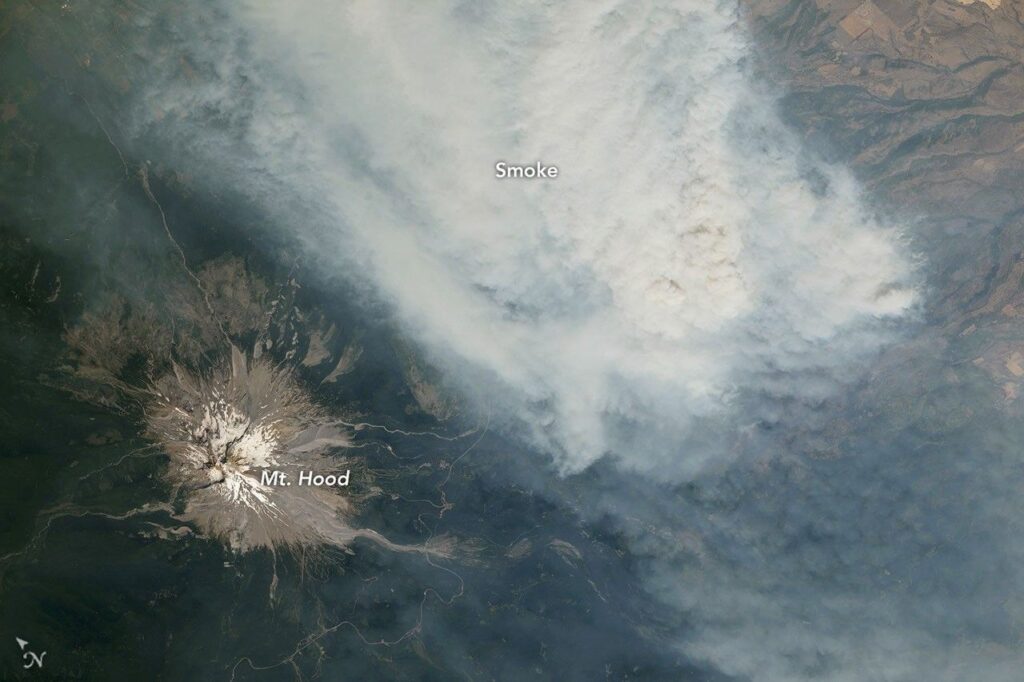Cascade Volcanoes Shrouded in Smoke