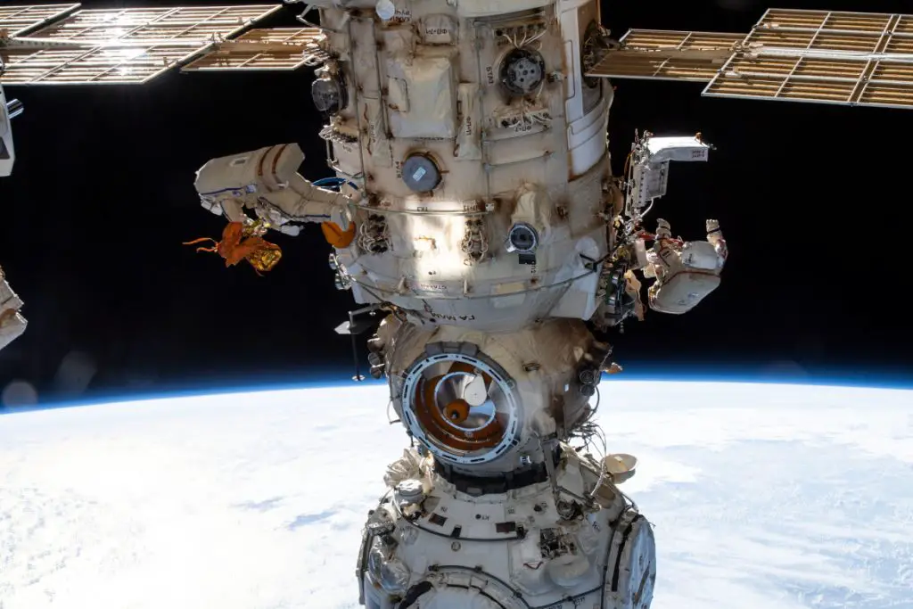 Russian spacewalk to end early as suit power issue appears