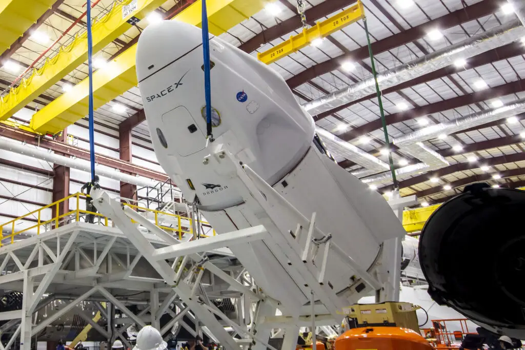 SpaceX installs Dragon spaceship on the rocket that’ll take it to space (again)
