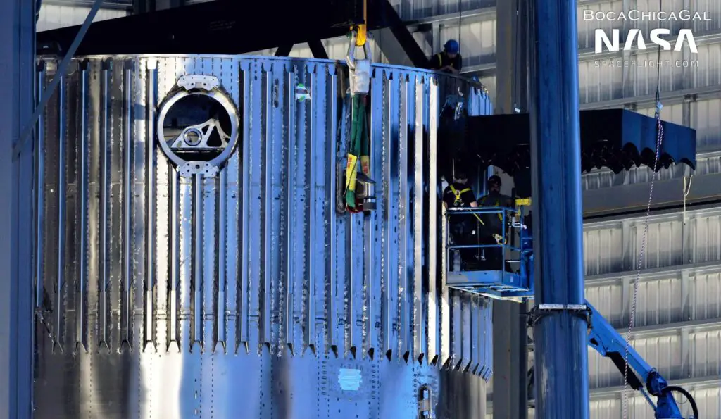 SpaceX installs full set of car-sized grid fins on second Super Heavy booster