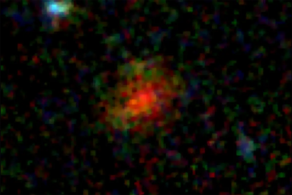 Daily Telescope: An ancient galaxy behind a veil of dust