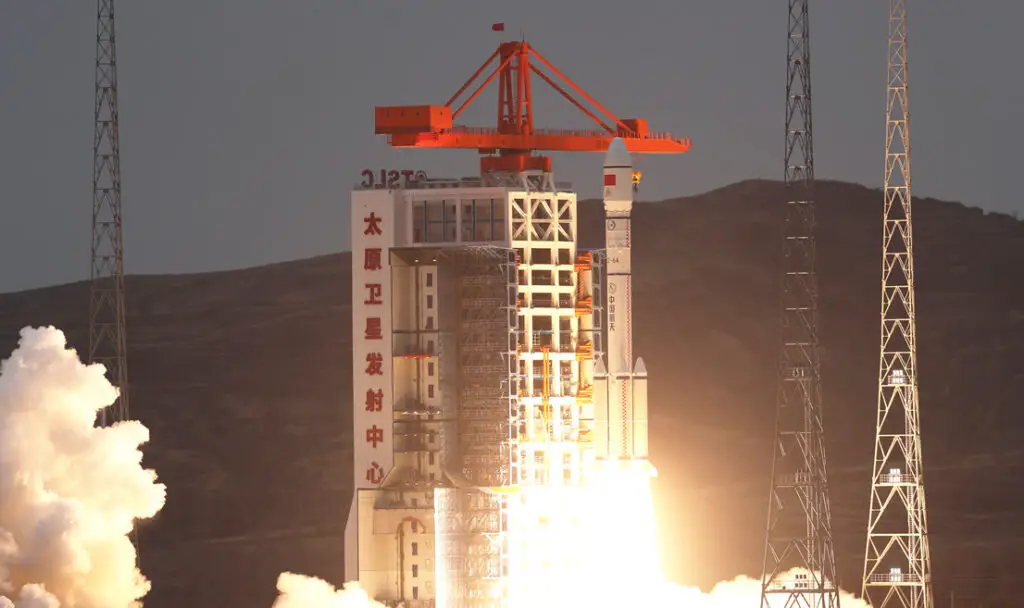 China launches three space missions, debuts new rocket configuration