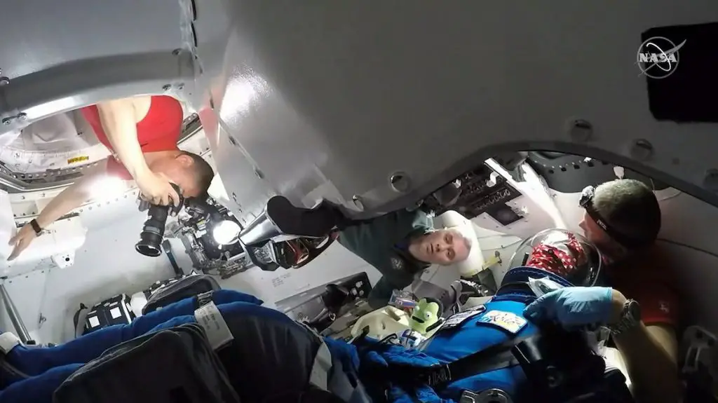 Space station astronauts check out Starliner crew capsule